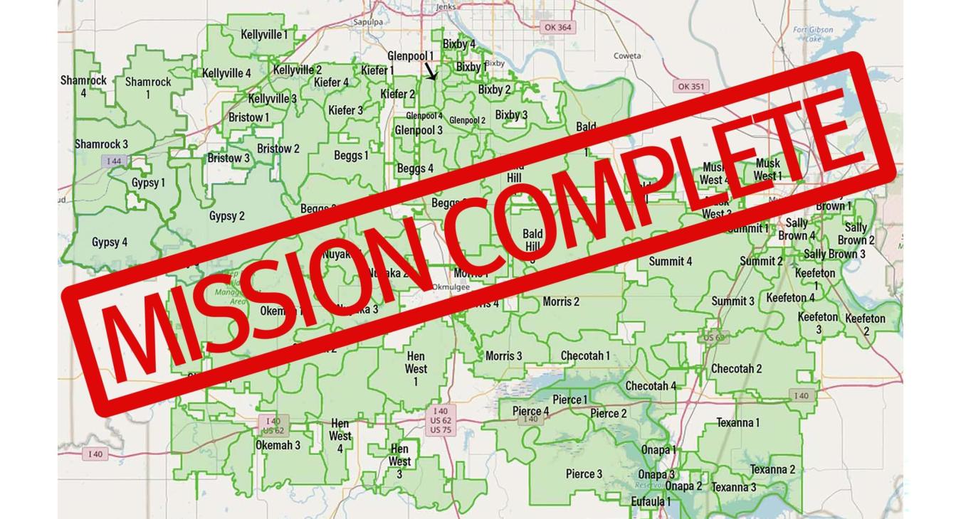 A Map of the ECE service territory, with a red stamp over it that says Mission Complete.